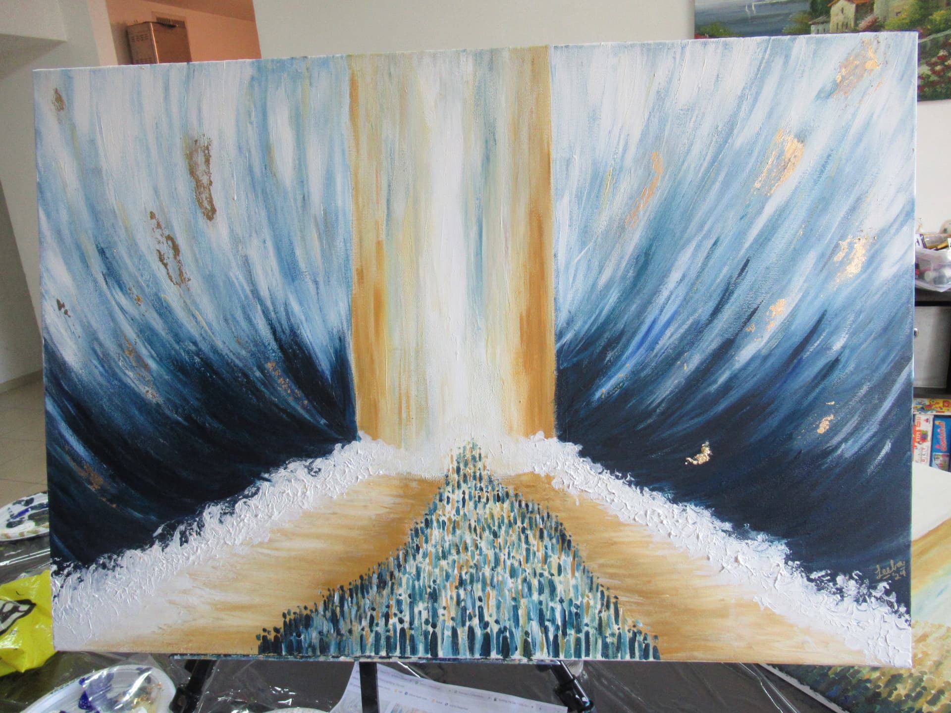 Student painting of the splitting of the sea with a path of people