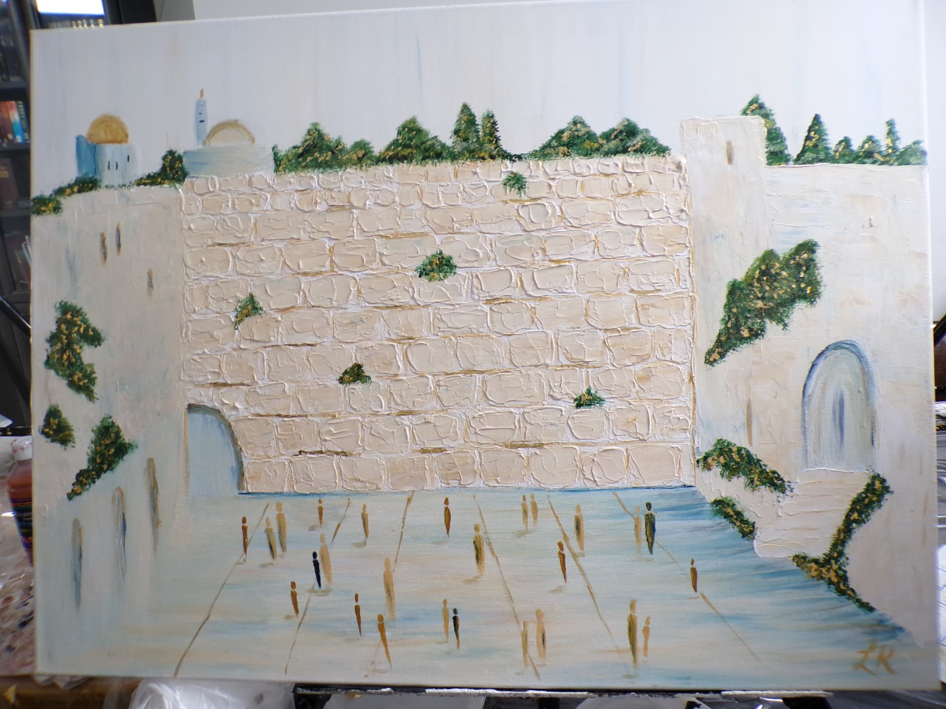 Student painting of the Kotel in pale blue, white, and gold