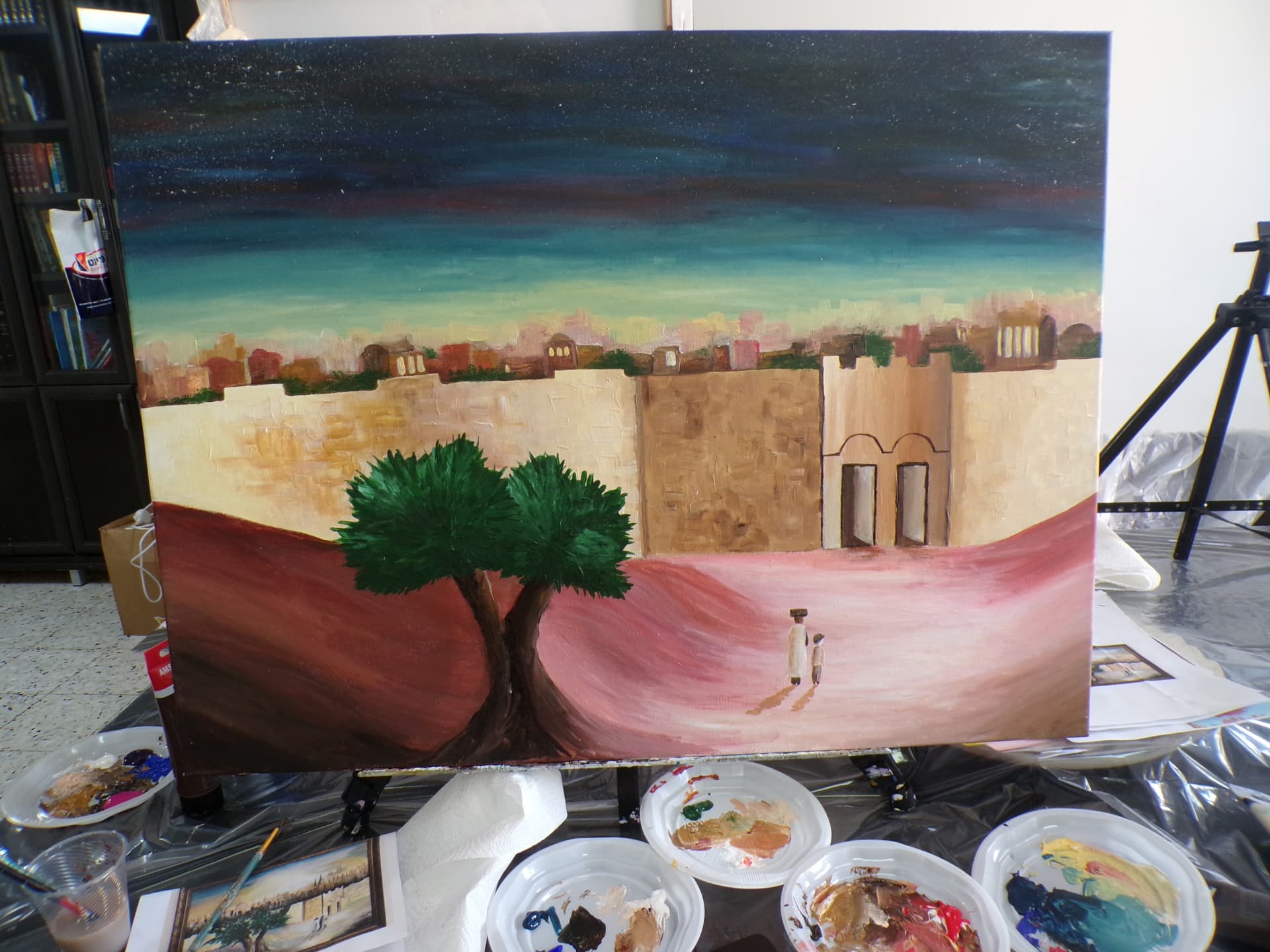 Student painting of a Jerusalem gate under a starry sky with an olive tree