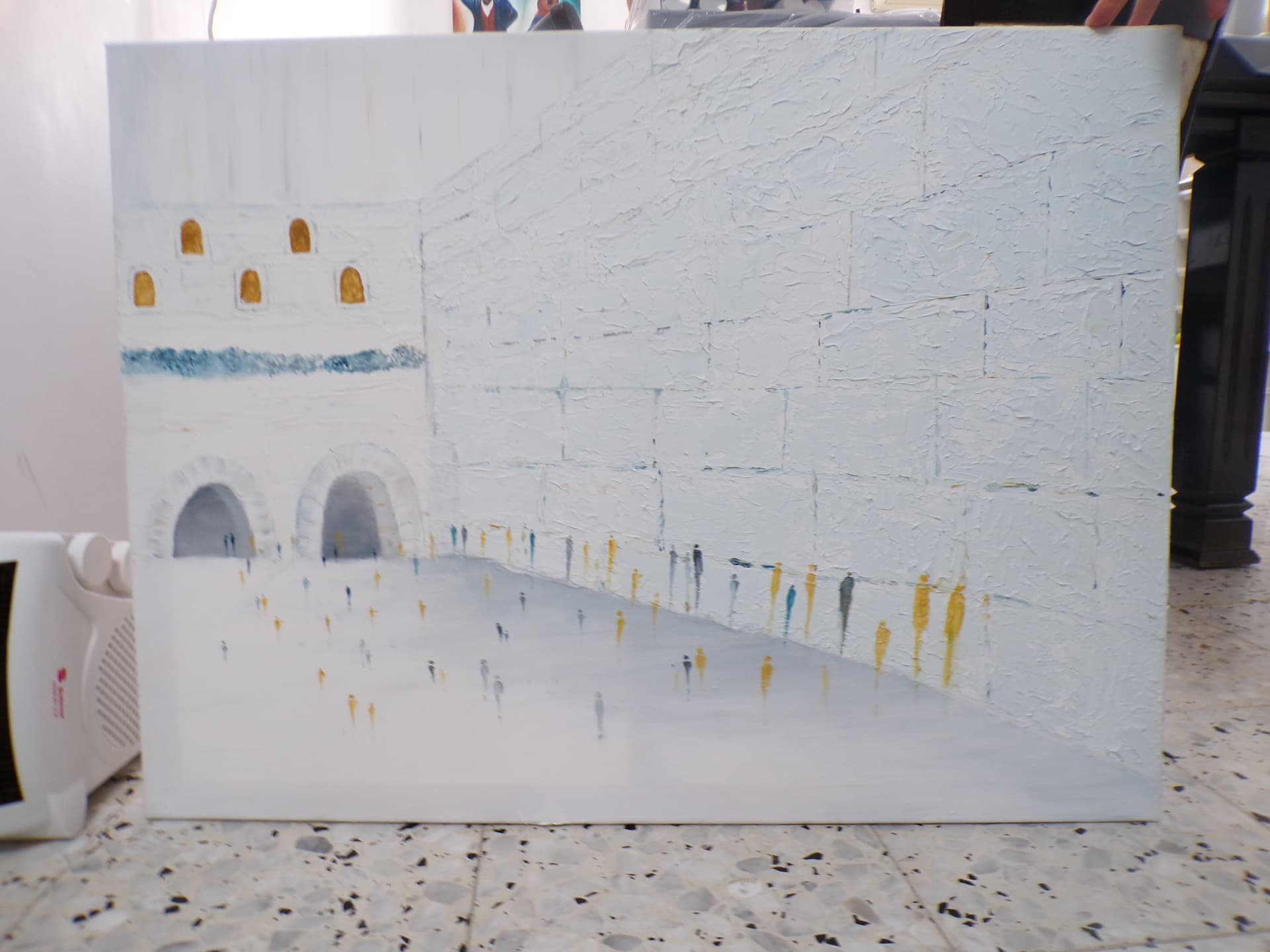 Student painting of the Kotel in icy white with gold figures
